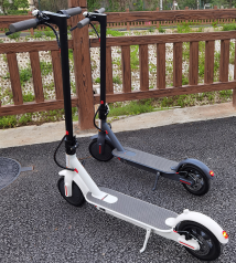 two EMOKO HT-H4 Pro Electric Scooter in black gray silver and white gleeride